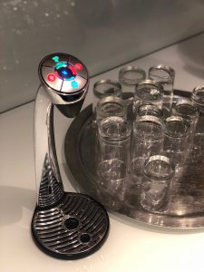 a group of glasses on a tray