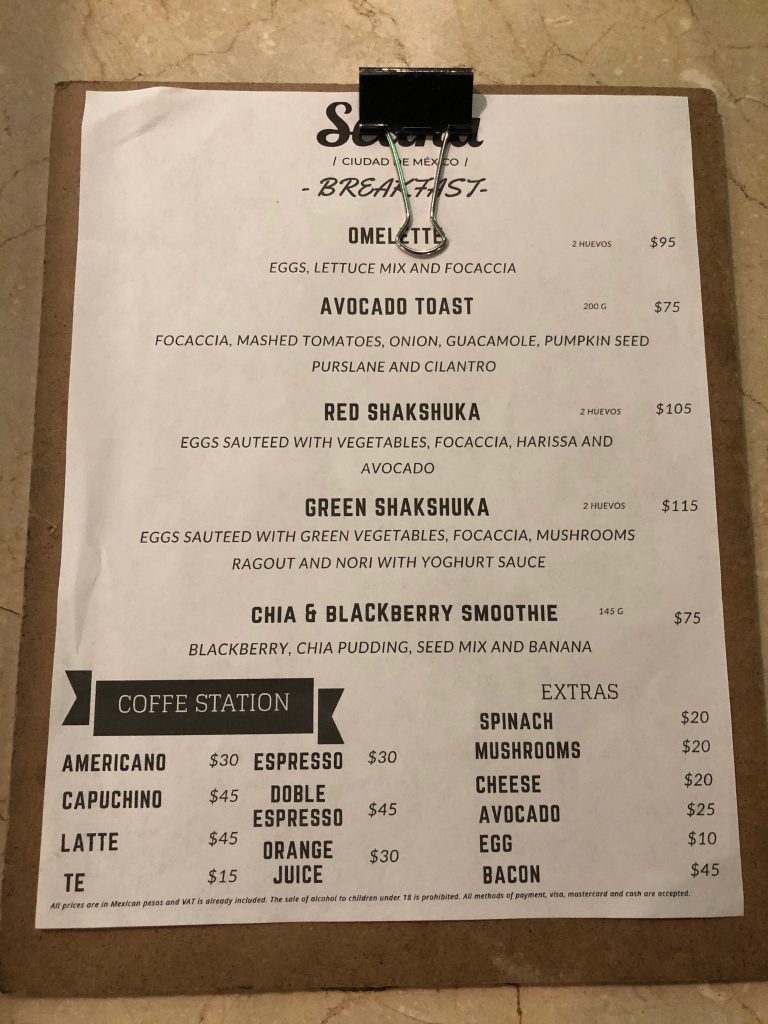 a menu with a clip on it